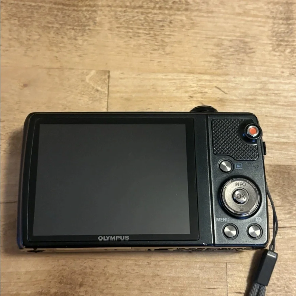 Olympus Black Digital Camera with 12.5x Super Wide Zoom
